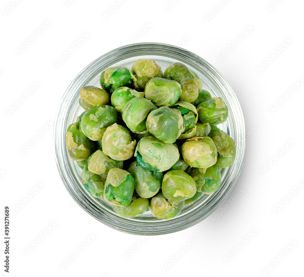 Green peas roasted in glass bowl isolated on white background ,include clipping path Green peas roasted in glass bowl isolated on white background ,include clipping path