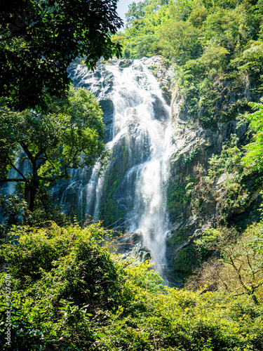 Beautiful landscape of tropical waterfall at khlong Lan national park, Kamphaeng Phet, Thailand.