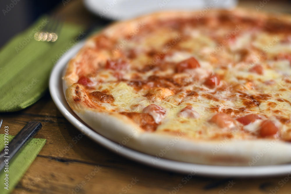 pizza on a wooden table