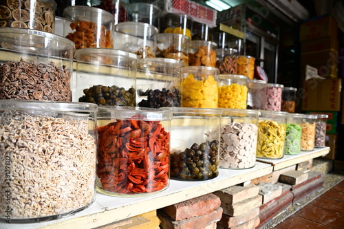 A local store at Dihua Street in Taipei, Taiwan sells traditional Taiwanese snacks in glass jars with stickers "Made in Taiwan".