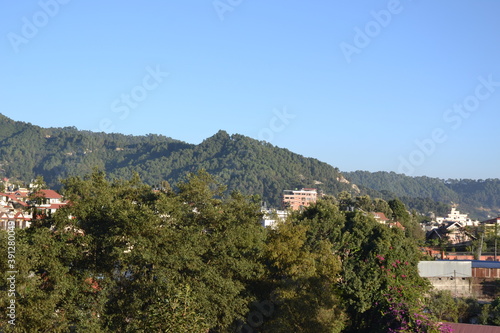 forest, hills, blue sky, green trees and beautiful landscape. Pictured in Kathmandu valley, Nepal. © PradyumnaPrasad