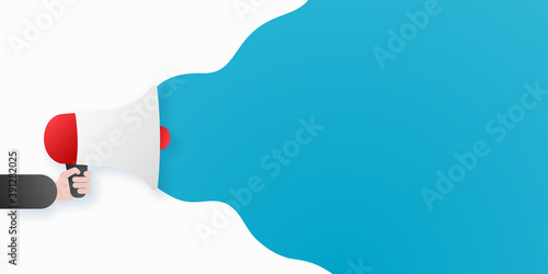 Megaphone, loud speaker or bullhorn in hand. Vector illustration