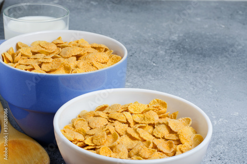 Corn flakes in a plate. Healthy breakfast. Copy space