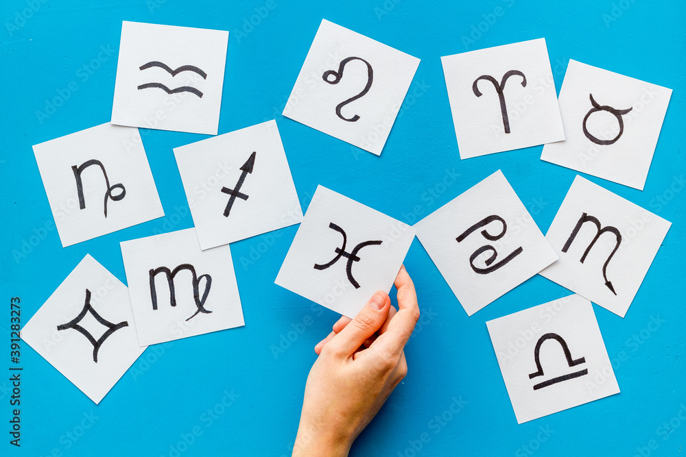 Flat lay of twelve zodiac signs. Horoscope concept, top view Flat lay of twelve zodiac signs. Horoscope concept, top view
