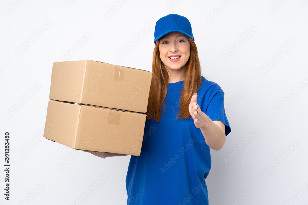 Young delivery woman over isolated white background handshaking after good deal Young delivery woman over isolated white background handshaking after good deal
