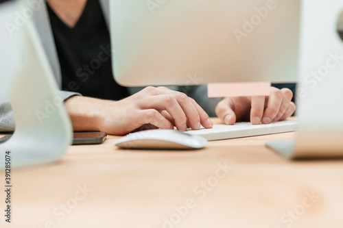 close up. business man typing on a computer keyboard