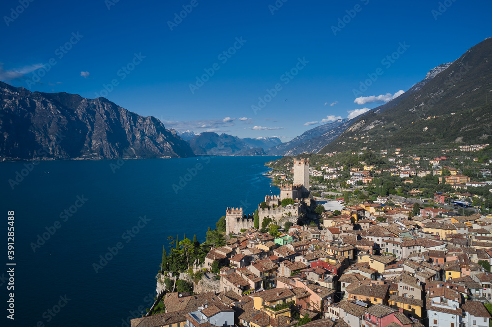 Malcesine town, Lake Garda, Italy. Panoramic aerial view of the Scaliger Castle in Malcesine in Malcesine. Italian resort on Lake Garda, Monte Baldo.