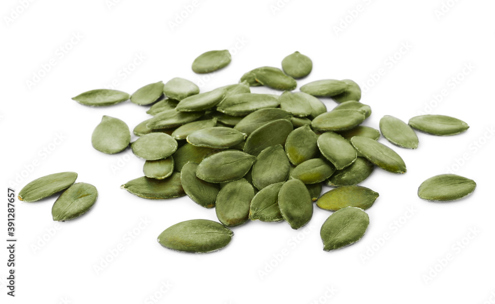 Pile of peeled pumpkin seeds isolated on white