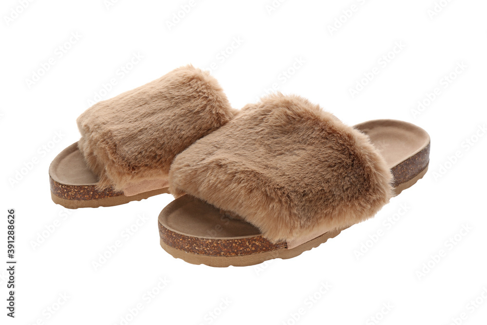 Pair of open toe slippers with brown fur on white background Pair of open toe slippers with brown fur on white background