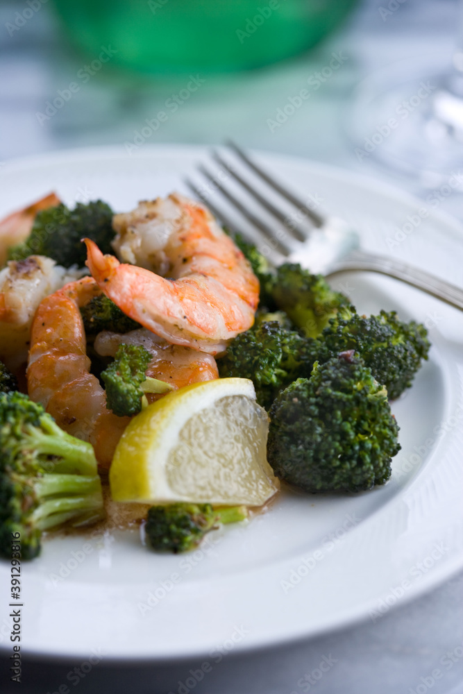 Roasted broccoli with shrimp on plate Roasted broccoli with shrimp on plate