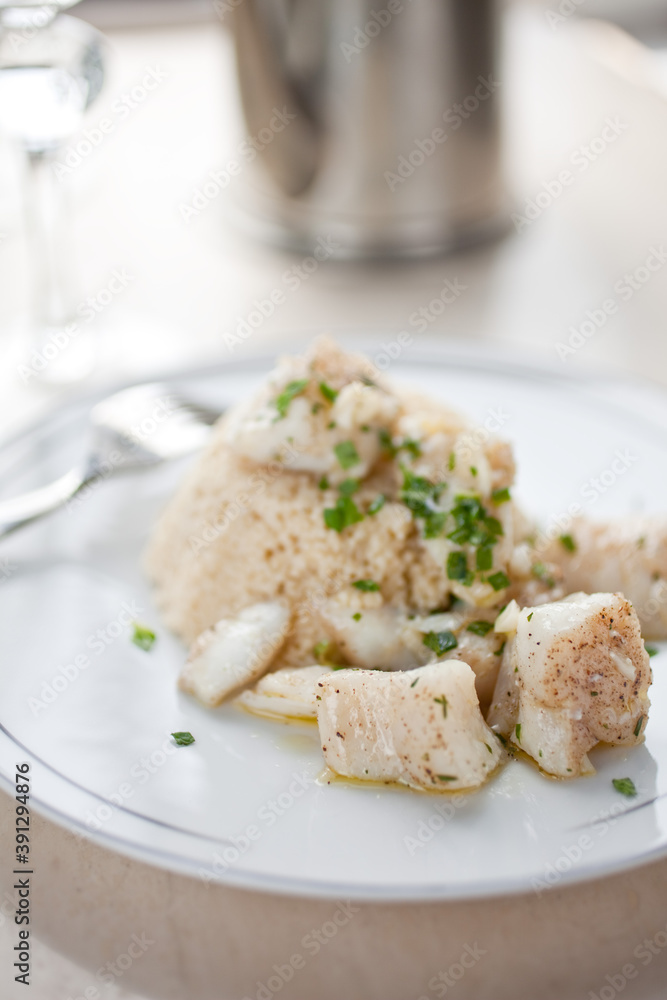 Close up of olive oil poached halibut nuggets Close up of olive oil poached halibut nuggets