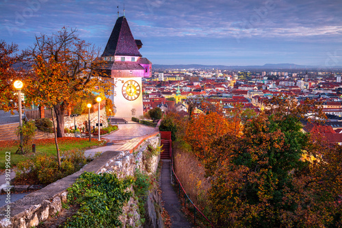 Graz, Austria. Cityscape image of the Graz, Austria with the Clock Tower at beautiful autumn sunset. photo