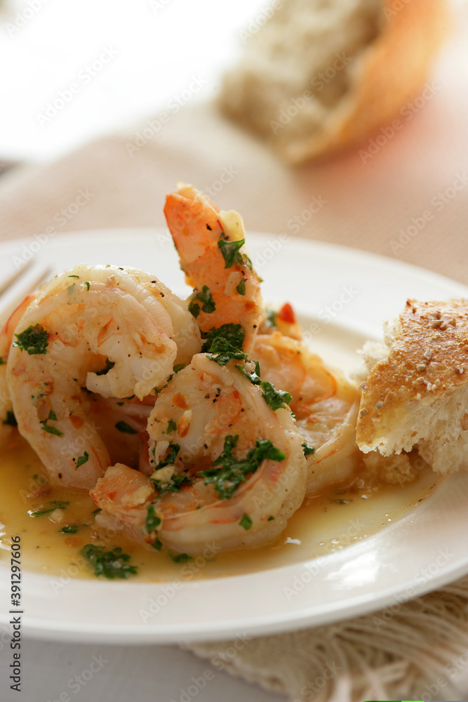 Close up of shrimps with parsley on plate Close up of shrimps with parsley on plate