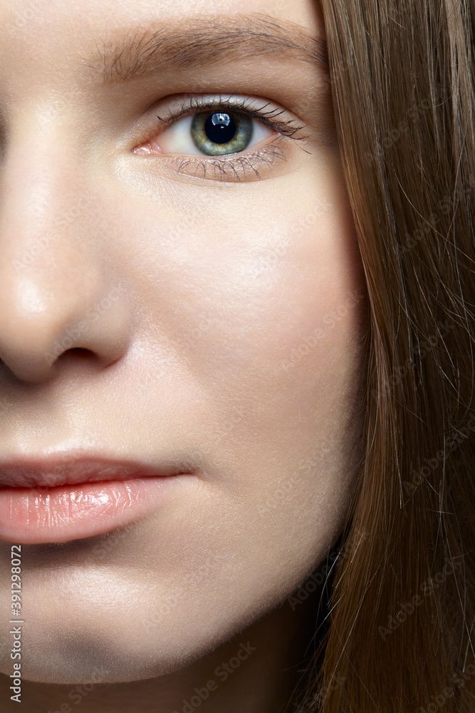 Closeup macro shot of human female face. Closeup macro shot of human female face.