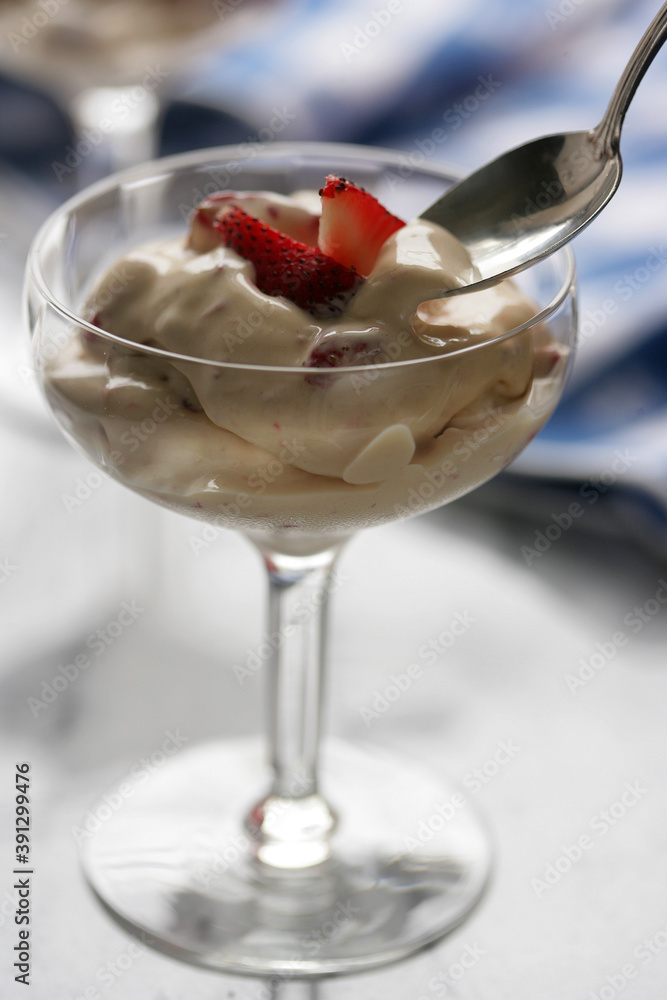 Close up of creamy dessert with strawberry Close up of creamy dessert with strawberry
