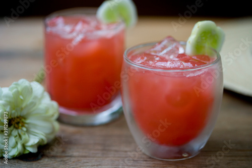 Close up of watermelon and cucumber punch with ice cubes
