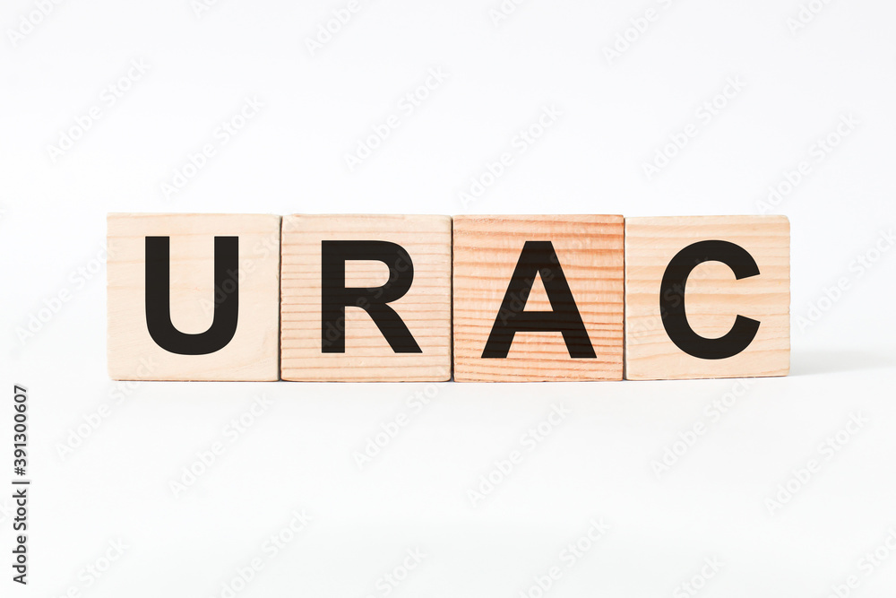 word URAC on wooden blocks, white background, business concept. business and Finance word URAC on wooden blocks, white background, business concept. business and Finance