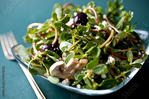 Close up of purslane salad with mushrooms photo