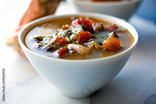 Close up of minestrone soup bowl photo