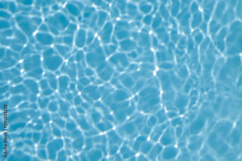 Beautiful swimming pool water reflextion for background, space for text and no person
