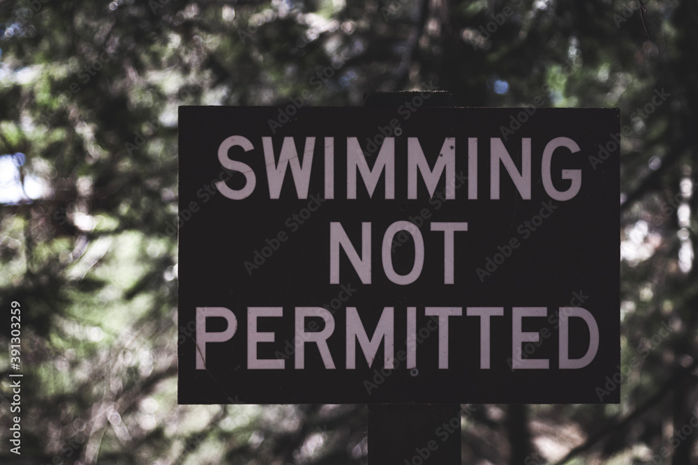 swimming not permitted sign at a lake in NY
concepts include warning, caution, direction
swimming not permitted sign at a lake in NY
concepts include warning, caution, direction