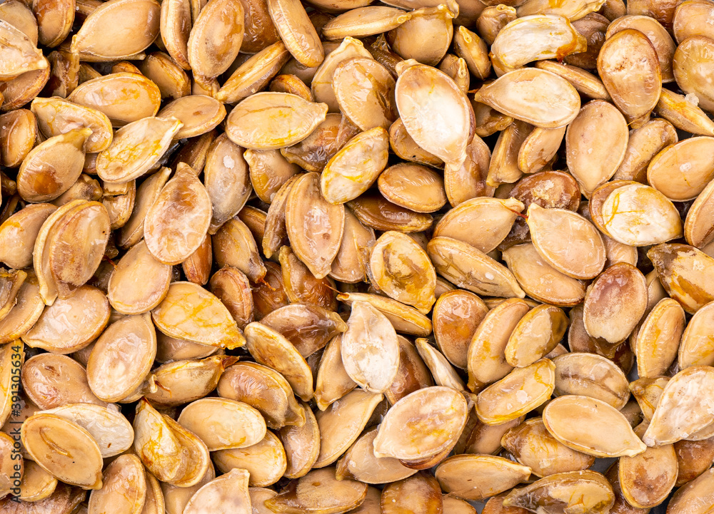 Close-up of fresh ripe pumpkin seeds pulled out. Close-up of fresh ripe pumpkin seeds pulled out.