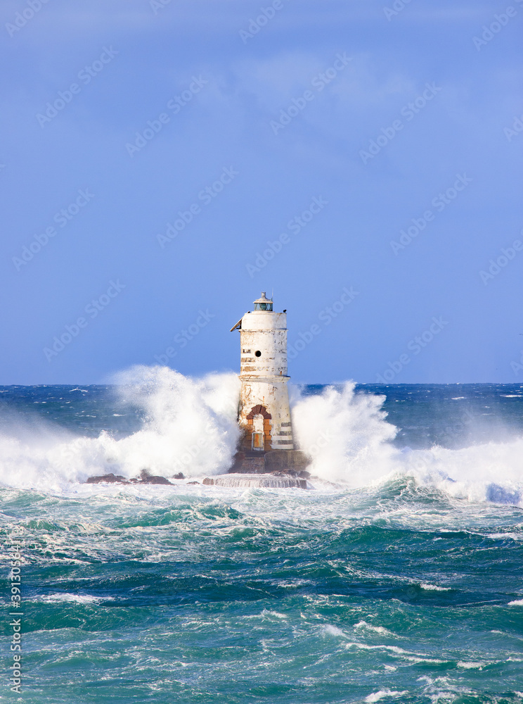 lighthouse of the mangiabarche of calasetta in a stormy day, sardinia
