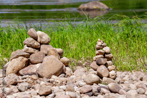 Stone piles on the river bank