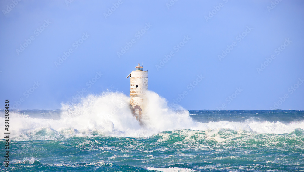 Lighthouse sea waves rain storm
