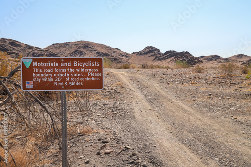 MECCA HILLS, CALIFORNIA, UNITED STATES - Oct 18, 2020: Mecca Hills Wilderness Boundary Sign photo