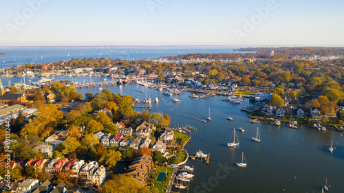 Aerial view of colorful sailboat moorings and docks on Spa Creek, in historic downtown Annapolis Maryland on a fall day photo