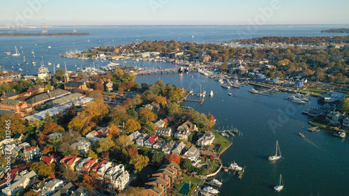 Aerial view of colorful sailboat moorings and docks on Spa Creek, in historic downtown Annapolis Maryland on a fall day photo