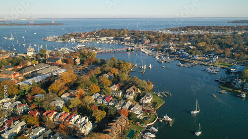 Aerial view of colorful sailboat moorings and docks on Spa Creek, in historic downtown Annapolis Maryland on a fall day