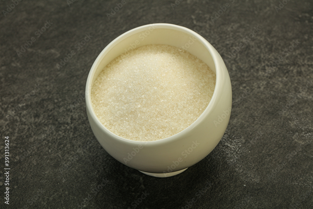 White sugar in the bowl White sugar in the bowl
