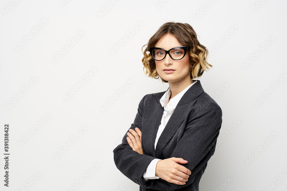confident business woman in suit gesturing with hands work light background confident business woman in suit gesturing with hands work light background