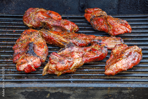 Country style Pork ribs in a Smoker. Selective focus, background blur and foreground blur 
