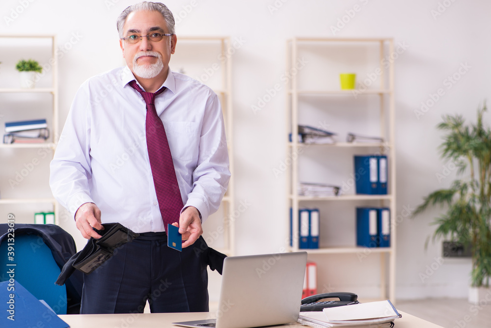 Old businessman employee in bankruptcy concept Old businessman employee in bankruptcy concept