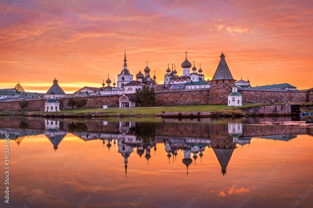 Solovetsky Monastery under a beautiful dawn orange sky