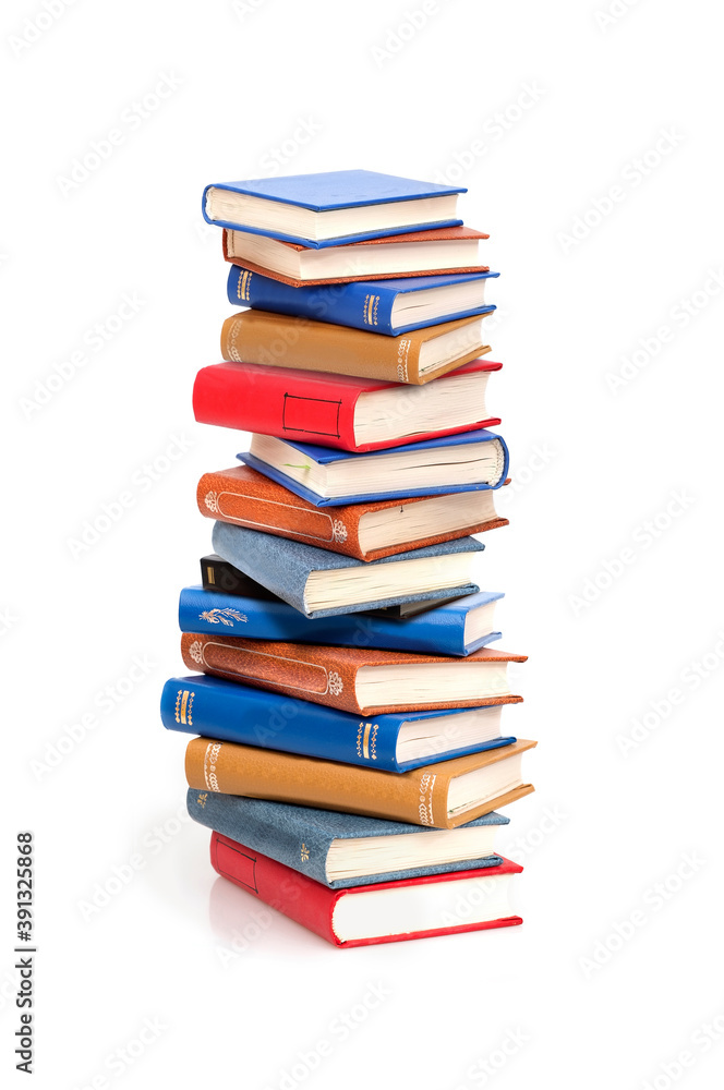 Stack of books in colour covers with white sheets isolated on a white background Stack of books in colour covers with white sheets isolated on a white background
