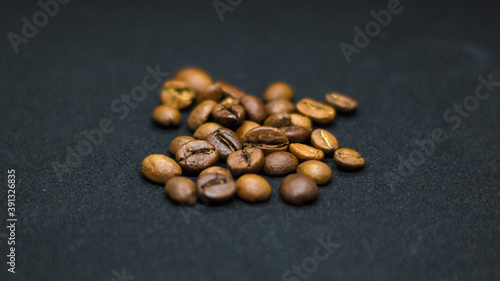 Close up of coffee beans on black background
