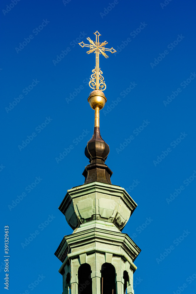 Prague, Czech republic - September 19, 2020. Golden details of the tops of Brevnov Monastery Prague, Czech republic - September 19, 2020. Golden details of the tops of Brevnov Monastery