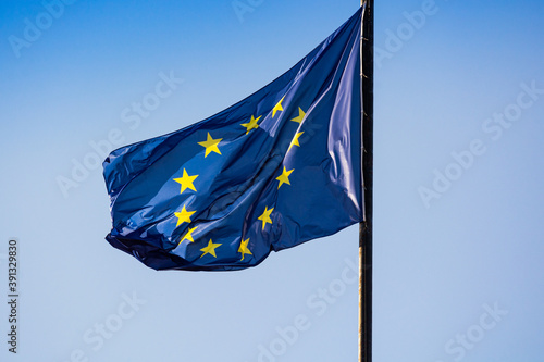 Prague, Czech republic - September 19, 2020. Flag of European Union flying in the wind on the blue sky