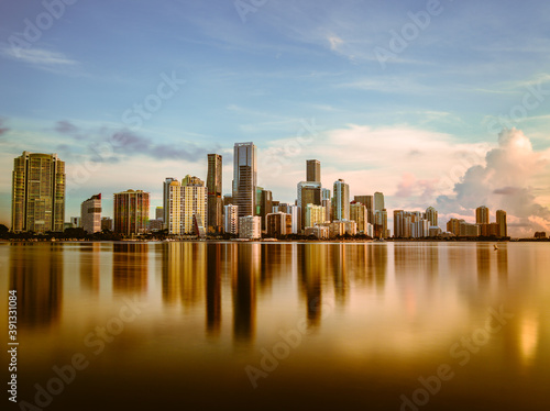 city skyline at sunset downtown miami florida usa reflection cityscape beautiful buildings panoramic water sky 