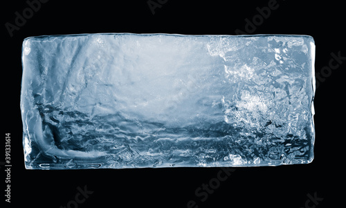 Textured natural ice block, isolated on black background. Clipping path included.