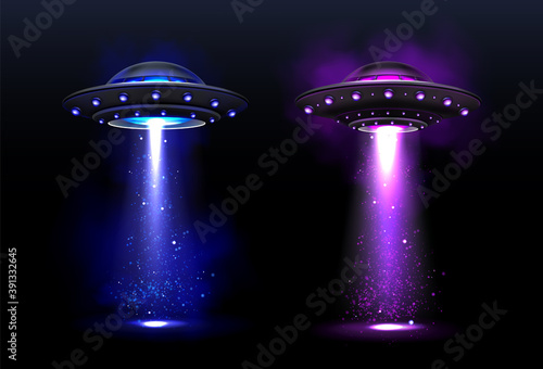 Alien spaceships, ufo with blue and purple light beam. Vector realistic illustration of futuristic flying saucer, unidentified round rocket. Clipart of galaxy spacecraft, glow rocketship
