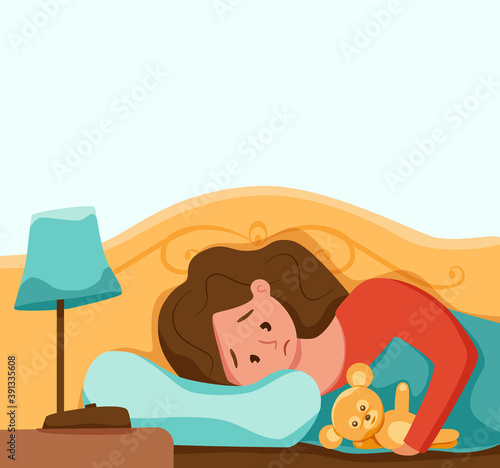 Sleepy awake child in bed suffers from insomnia