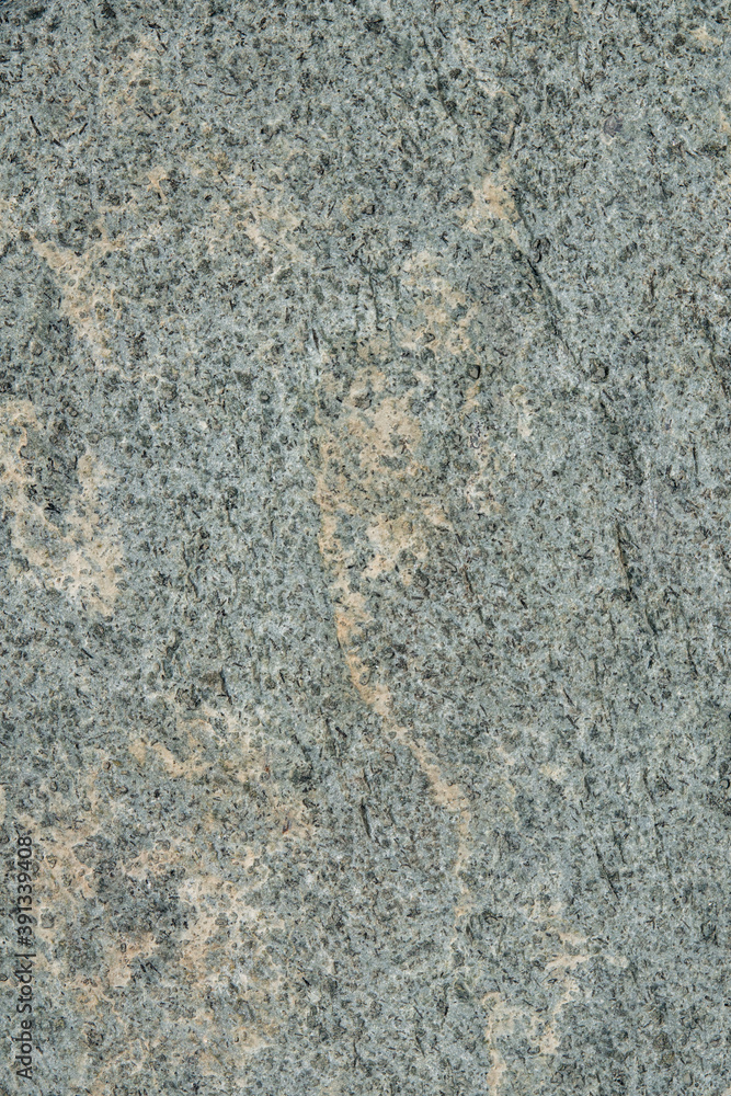 Natural stone grey granite background. Bright hard grey granite rock texture. Grey granite stone background. Grey granite untreated surface. Natural stone grey granite background. Bright hard grey granite rock texture. Grey granite stone background. Grey granite untreated surface.