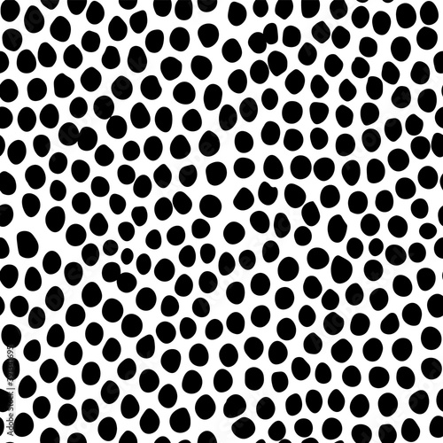 Dots or spots pattern. Seamless texture background. Trendy irregular design. Painted brush strokes drops. Chaotic hand drawn tile. Abstract art fashionable fabric. Vector black and white textile.