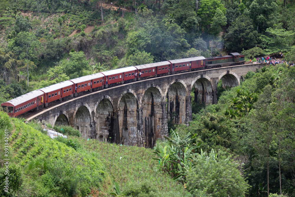 Ella Sri Lanka 4.15.2018 the 9 arch Demodara Railway Bridge with train