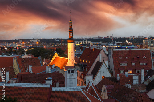 TALLINN, ESTONIA - OCTOBER, 2, 2019: Evening top view of night Tallinn, Estonia. Old and new buildings. Dramatic sunset sky